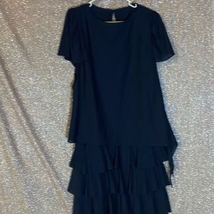 Dark blue dress with layered frilled bottom.